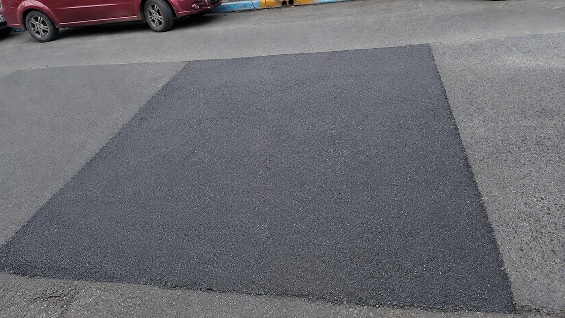 Calle que necesita reparación